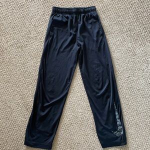 Boys Nike Drifit pants. Size medium.